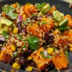 ['Close-up view of a colorful roasted sweet potato black bean quinoa salad in a bowl.', 'Side view of a vibrant salad featuring sweet potatoes, black beans, and quinoa.', 'A detailed image of a hearty quinoa salad with roasted sweet potatoes and other ingredients.', 'Close-up of a mixed salad showcasing sweet potatoes, quinoa, and black beans.']