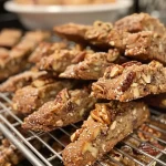 Close-up view of fig and walnut biscotti showcasing its texture and ingredients.