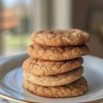 Close-up of golden brown healthy snickerdoodles on a plate.