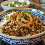 Close-up of Mujadara, a dish with lentils and rice topped with golden caramelized onions.
