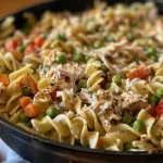 Close-up view of a delicious turkey and rice dish with vibrant colors and textures.